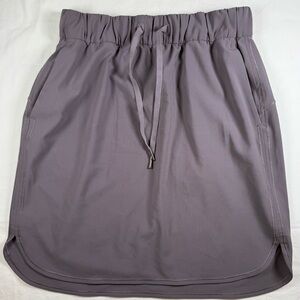 Lululemon On the Fly Women’s purple skirt sz 6 pockets